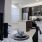 a kitchen with a table and chairs