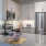 a kitchen with white cabinets