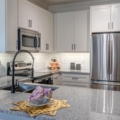 Beautiful kitchens with designer finishes a kitchen with white cabinets