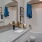 a bathroom with a marble countertop