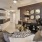 a living room with a large ceiling fan and a couch
